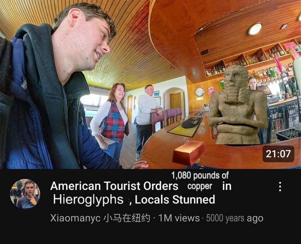 The meme is an image of a person sitting at a bar, looking at a statue of a man that has been Photoshopped to have a remarkably similar face to the bar patron. The text overlay reads "1,080 pounds of copper in hieroglyphs, locals stunned".